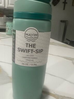 The Swift-Sip 26 oz Water Bottle in Mint Green